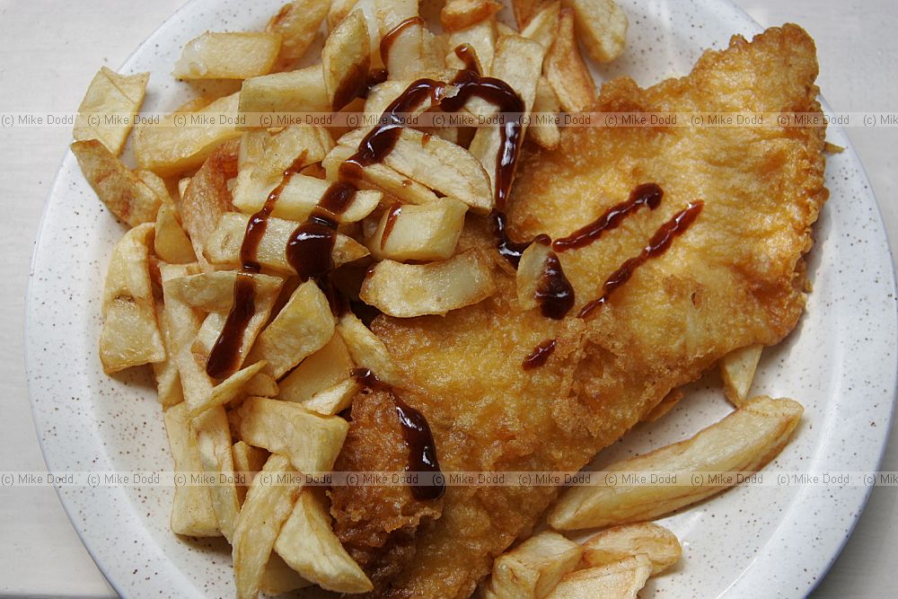 Fish and chips with brown sauce