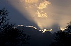 Sunbeam behind cloud