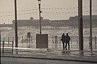 Stormy sea Blackpool with people on promenade
