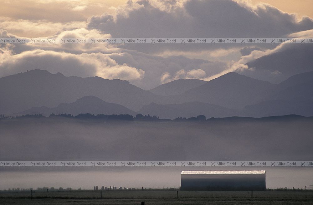 Morning mist and cloud formations near Lake Manapouri south island