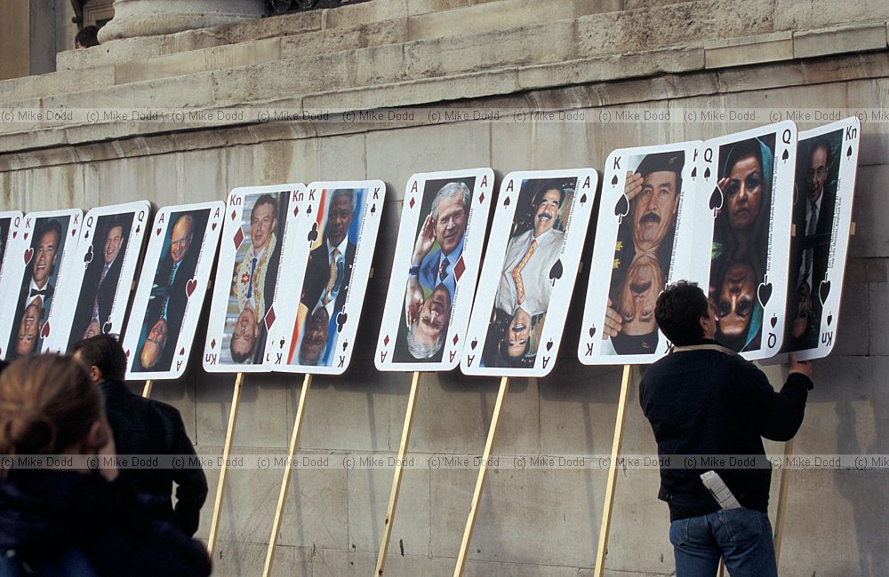 Plaaying card placards showing most wanted terrorists including president Bush