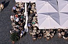 People sitting outside cafe Old town square (Staromestske Namesti) Prague