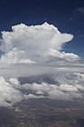 Cumulus developing into cumulonimbus from plane