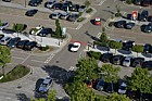 Carpark from above with cars and trees