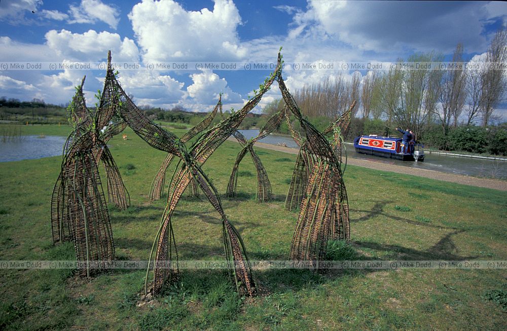 Circle dance living sculpture made out of willow by Clare Wilks.  Campbell park, Milton Keynes.