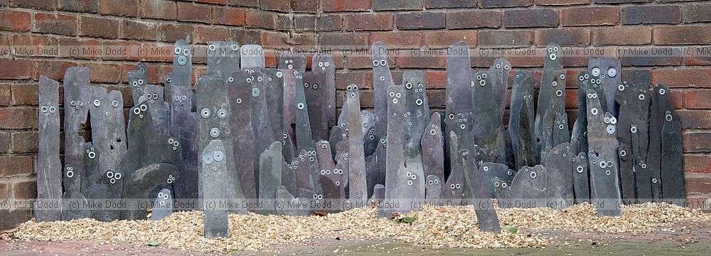 This land is our Land sculpture by Graham Mills in Slate at Open University Walton Hall