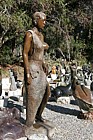 Selling stone sculptures on roadside near Scarborough Cape peninsula