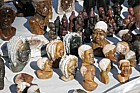 Selling stone sculptures on roadside near Scarborough Cape peninsula