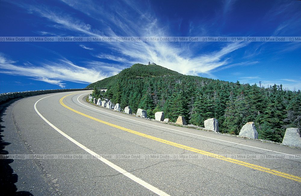 road to the top of Whiteface mountain Adirondacks New York state and cirrus clouds
