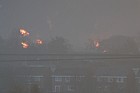 Huge fire at Buncefield oil storage depot Hemel Hempstead picture taken at dawn showing vast plume of smoke some shots with fireball too