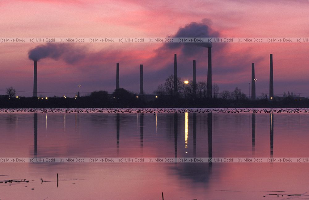 Brickworks Stewartby with smoking chimneys sunrise