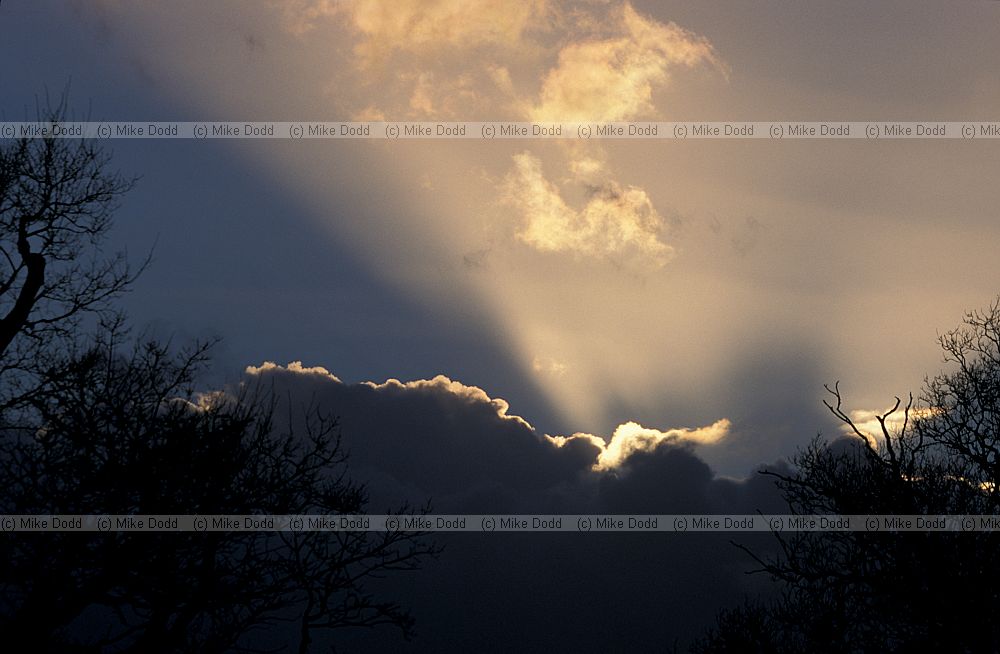 Sunbeam behind cloud