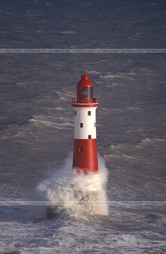 Beachy head light house in stormy sea Sussex