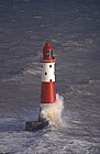 Beachy head light house in stormy sea Sussex
