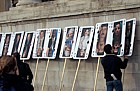 Plaaying card placards showing most wanted terrorists including president Bush