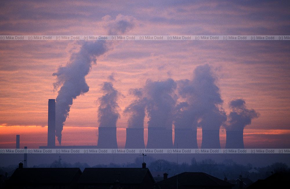 Ratcliffe on soar power station at dawn with steam rising Nottinghamshire