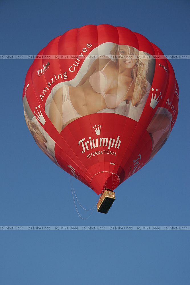 Amazing curves Triumph International underwear red hot air balloon with huge image on the side showing model in underwear