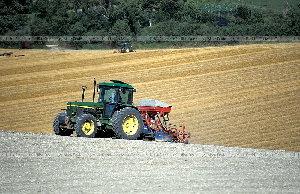 Seed drilling with tractor on south downs, Sussex
