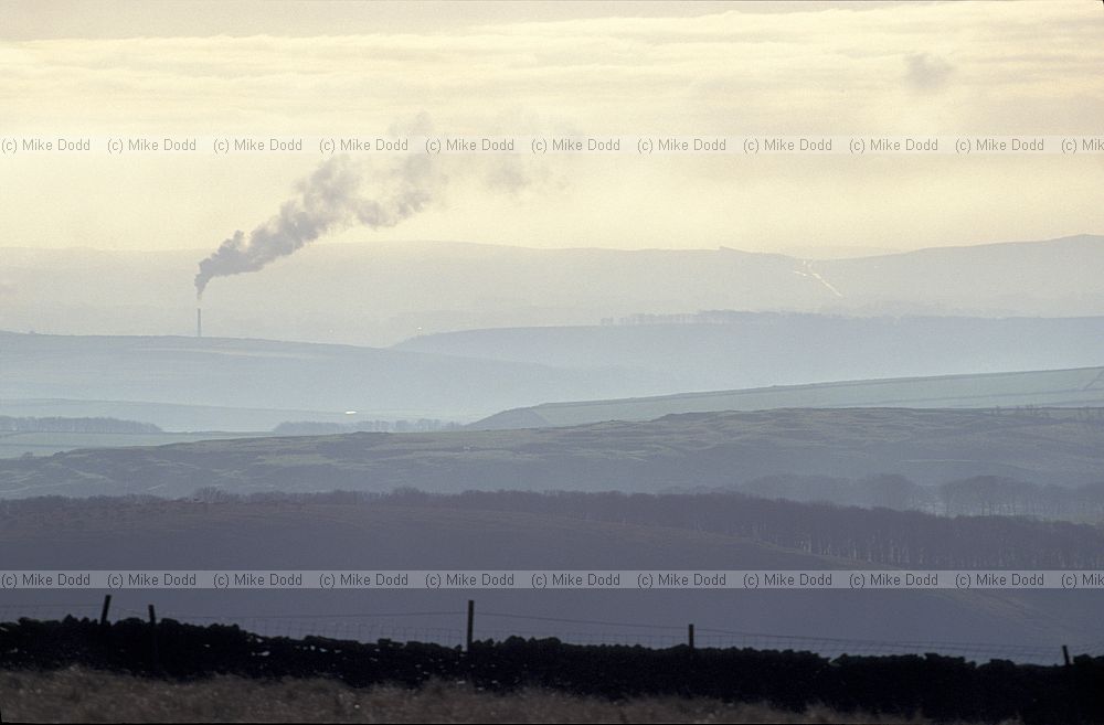 view south from Rushup edge with smoking chimney and aerial perspective, Peak District