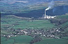 Cement works with smoking chimney, Castleton, Peak District