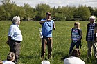 David Gowing demonstrating water level monitoring on a floodplain meadow