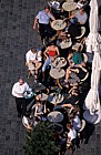 People sitting outside cafe Old town square (Staromestske Namesti) Prague