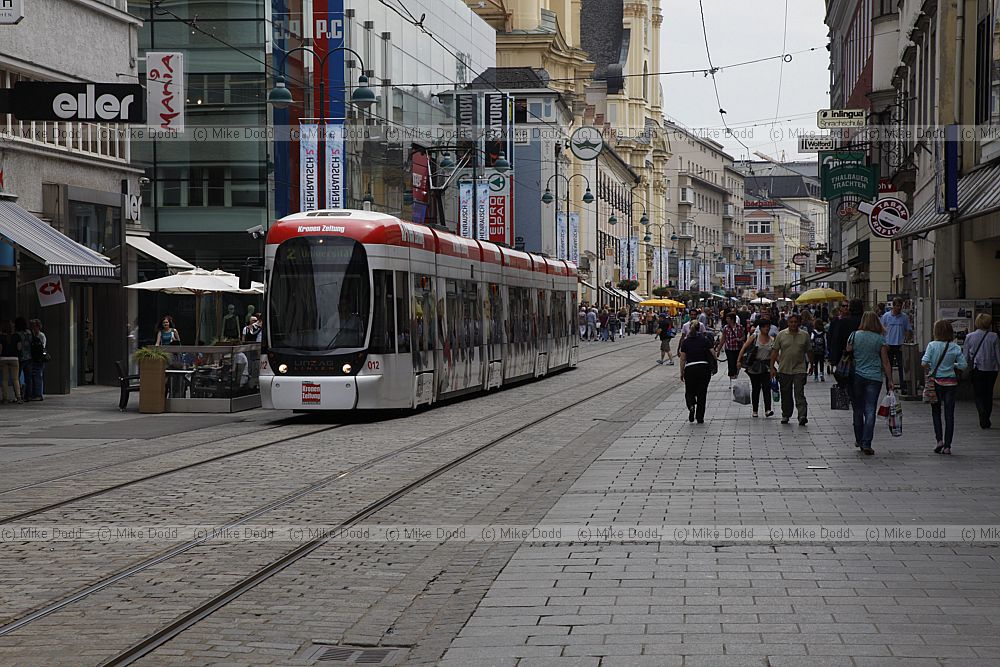 Landstrasse Linz with shoppers and trams