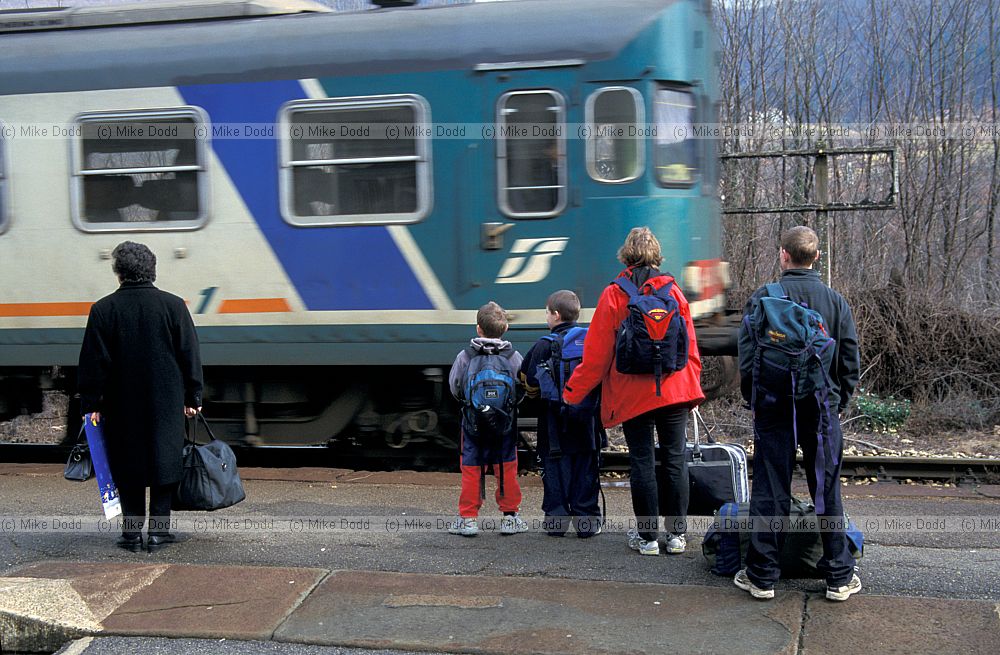People waiting to board train Camporgiano
