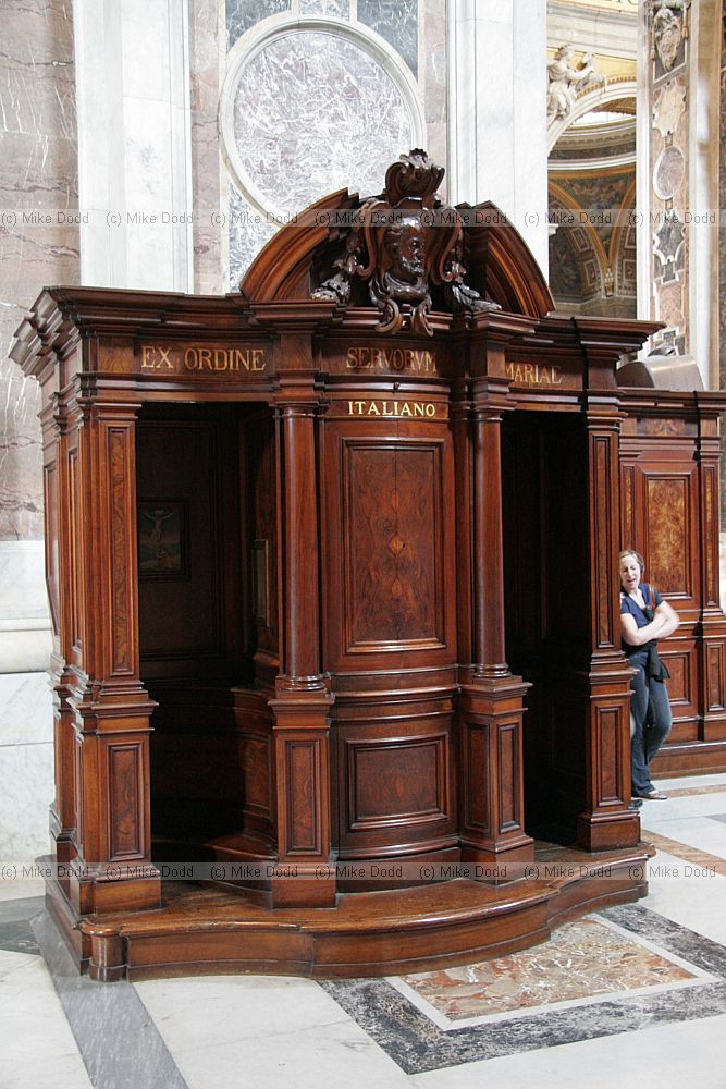 Confession box inside St Peters Basilica Vatican Rome