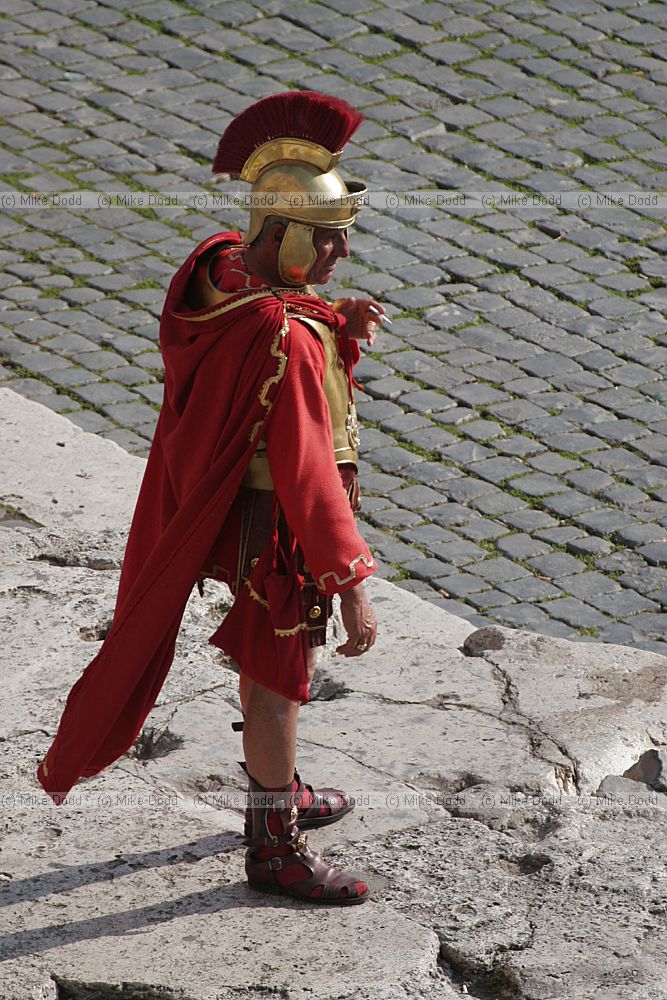 Roman solider smoking cigarette at Colosseum