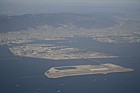 Newly created land in sea on flight path from Osaka airport
