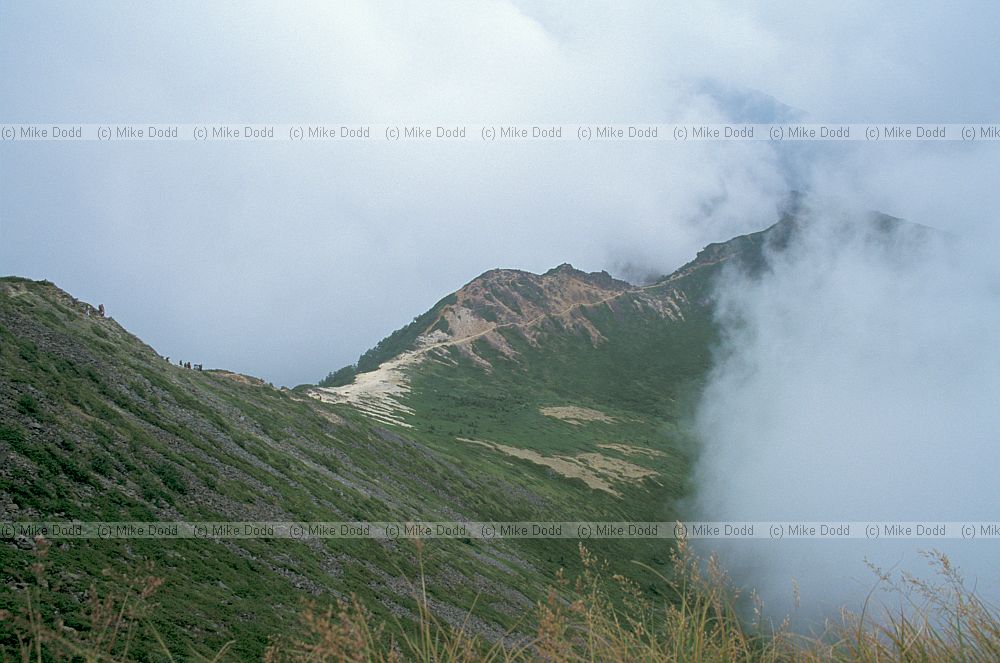 Japan alps ridge and clouds near Chausu