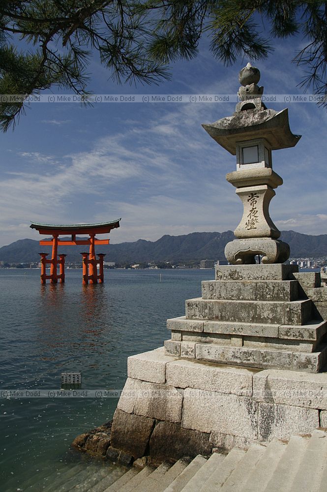 Lamp and O-Torii gate to the Itsukushima shrine Miyajima Japan