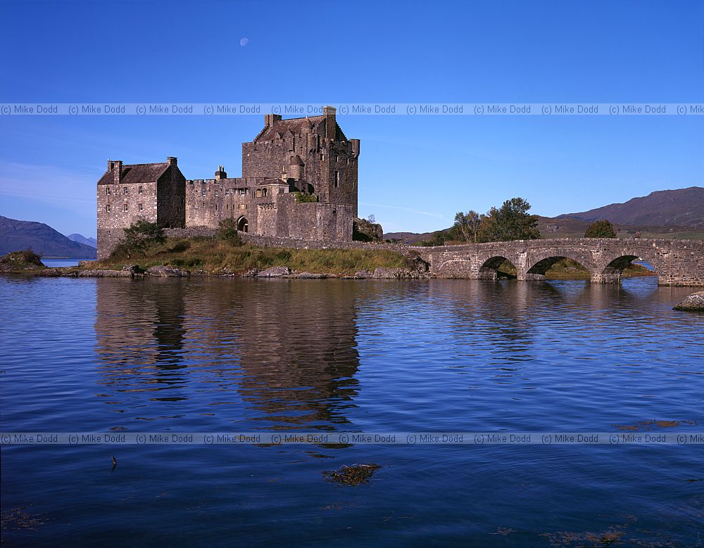 Eilean Donan castle and moon Scotland