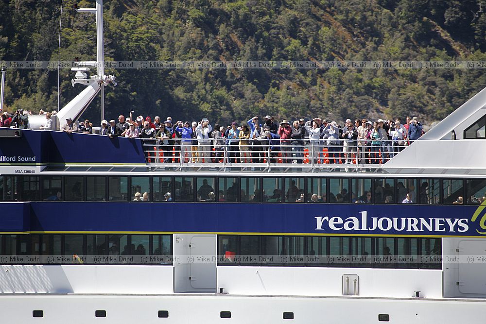 Crowds on tourist boat Milford Sound