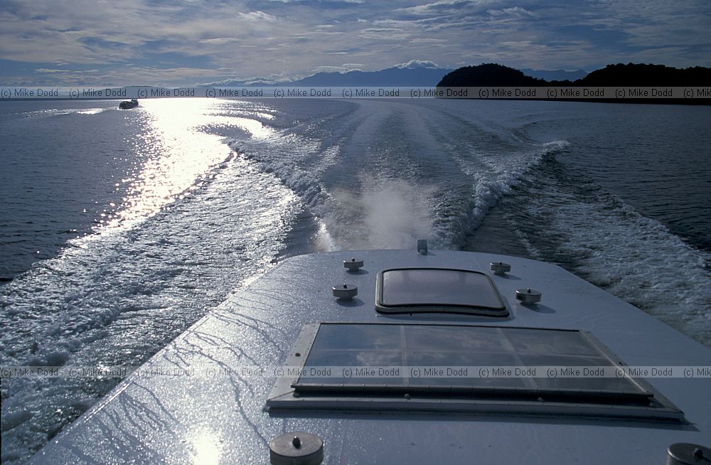 Jet boat crossing lake Manapouri