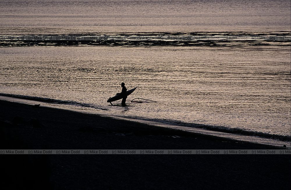 windsurfer at evening Lake Manapouri south island