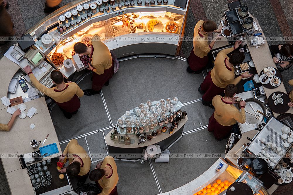 Waiters and cashiers from above