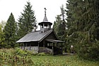 Wooden chapel in forest near Goritsy