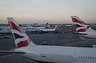 British Airways planes at Heathrow airport London lined up in the evening