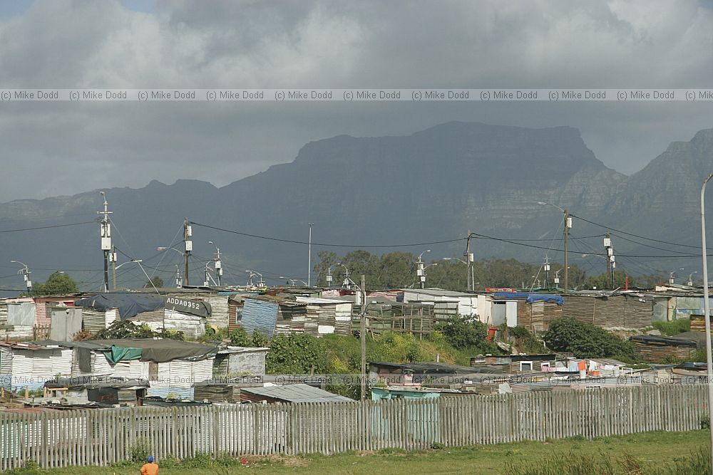 Edge of Khayelitsha township and squatter camps informal settlements from motorway Cape Town