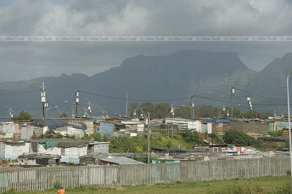 Edge of Khayelitsha township and squatter camps informal settlements from motorway Cape Town