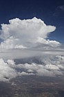 Cumulus developing into cumulonimbus from plane