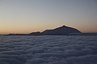 Mount Teide sunset with cloud sea from plane