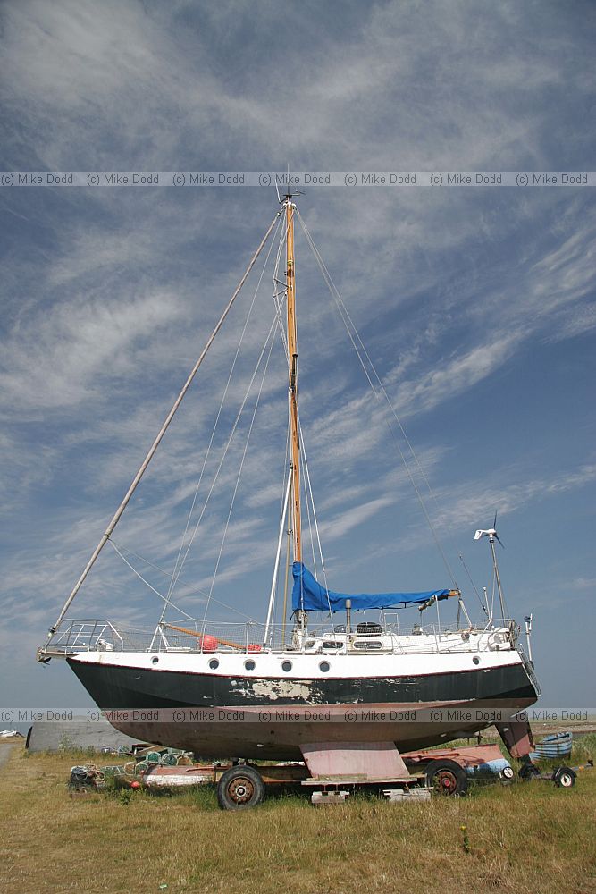 Boat and cirrus clouds
