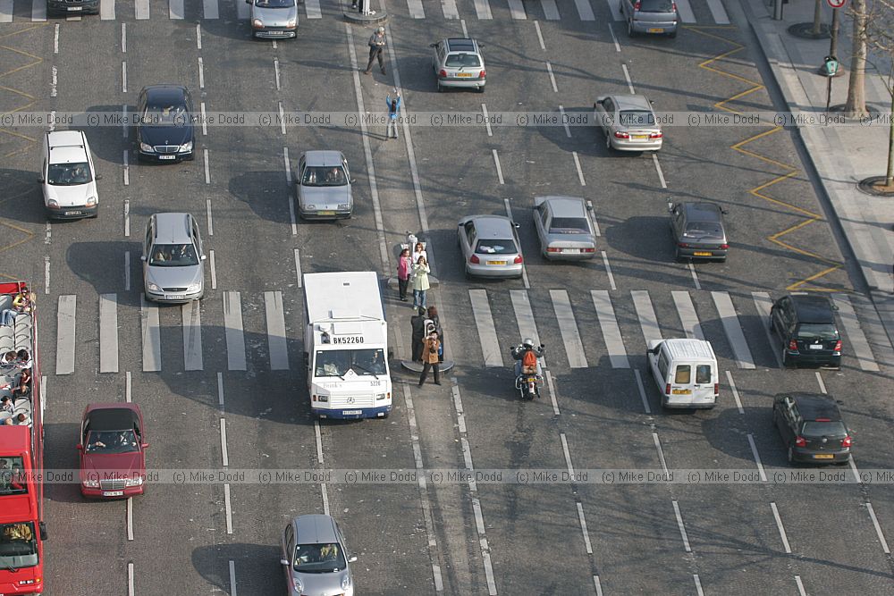 Traffic and people from Arc de Triomphe Paris