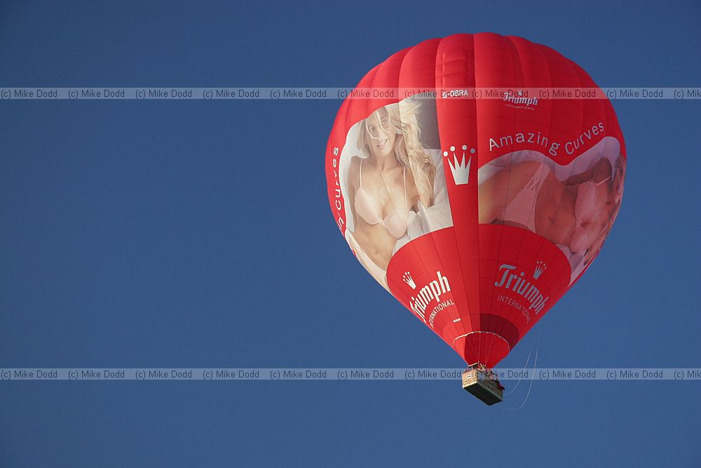 Amazing curves Triumph International underwear red hot air balloon with huge image on the side showing model in underwear
