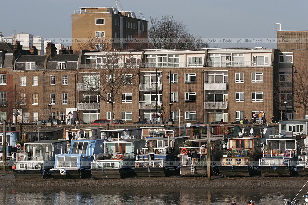 House boats and flats river Thames Chelsea London