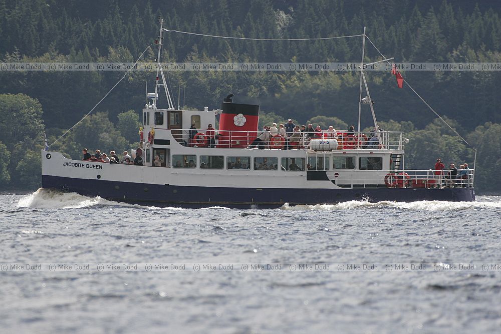 Jacobite Queen boat on Loch Ness against the light