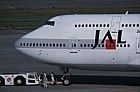 Boeing 747 jumbo jet JAL being toed